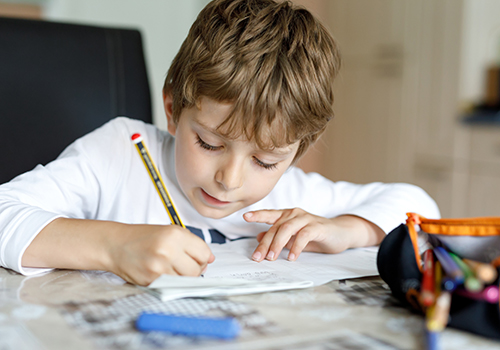 boy doing homework