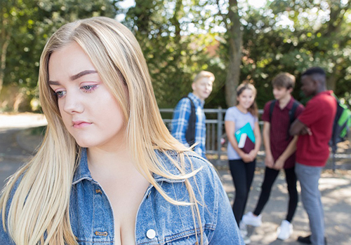 teenage girl and crowd behind her