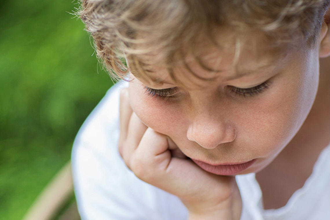 Little boy looks sad